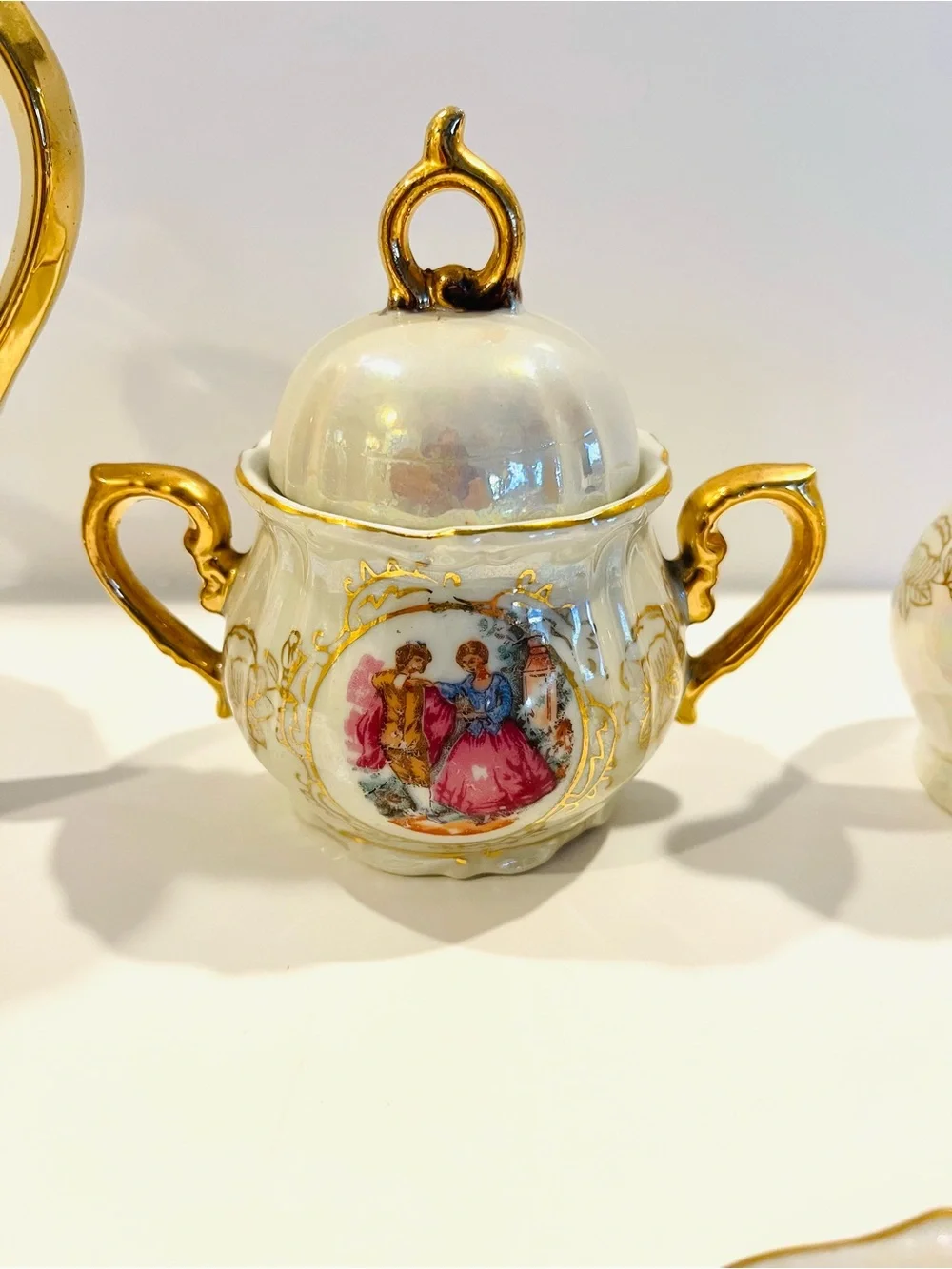 vintage porcelain tea service set from Japan features an iridescent finish